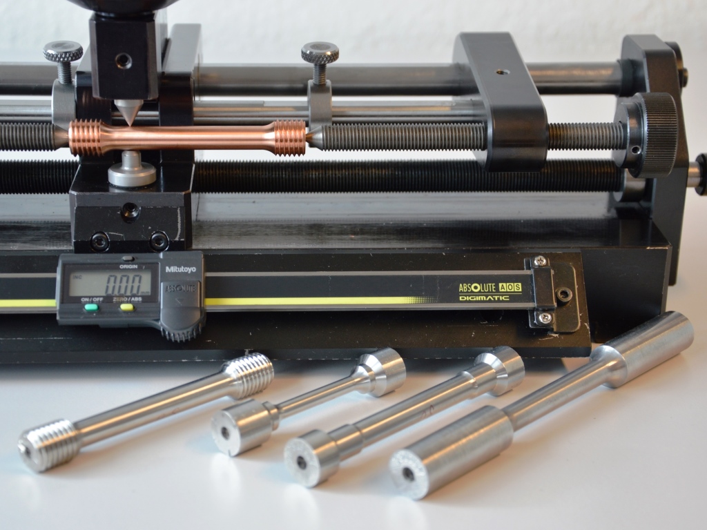 Drop weight marking system for round samples